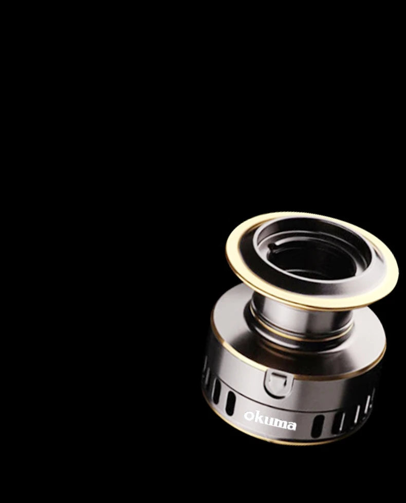 Carrete giratorio Okuma HE500–HE7000, freno de 12 kg, metálico, ambidiestro