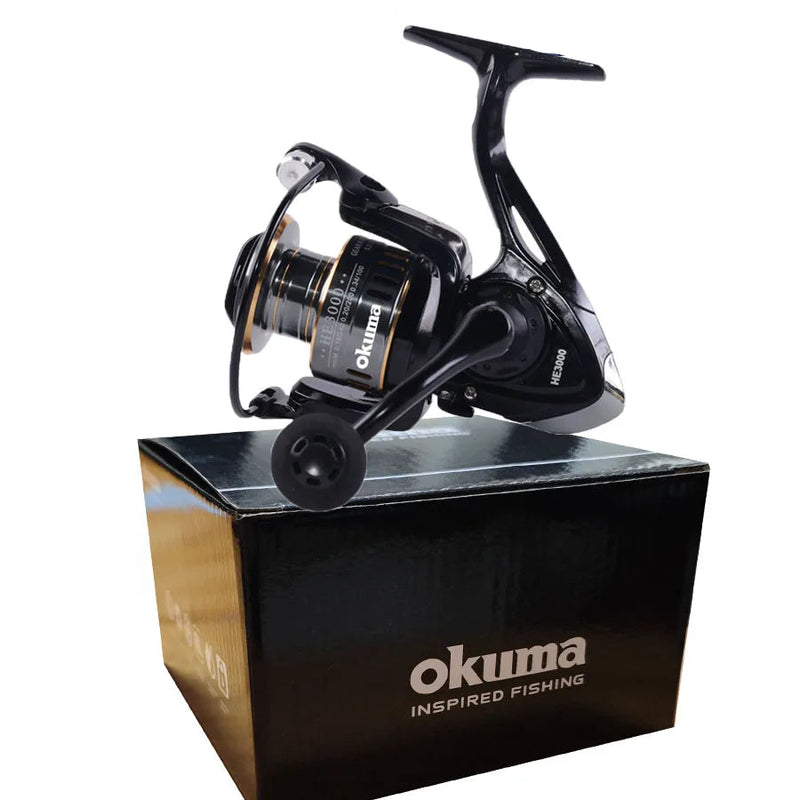 Carrete giratorio Okuma HE500–HE7000, freno de 12 kg, metálico, ambidiestro